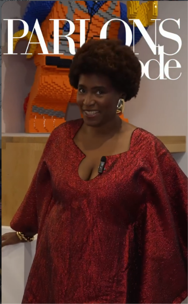 Rosy Sambwa in a red lamé boubou during a #ParlonsMode capsule